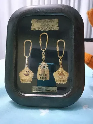 Estojo com 3 chaveiros olímpicos