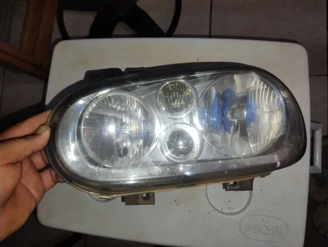 Farol original Golf sapão lado motorista