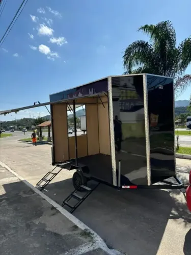 Trailer loja aceitamos troca