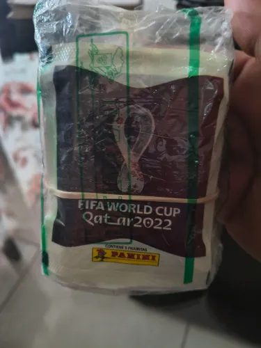 Pac lacrado copa 2022, podendo ter extras