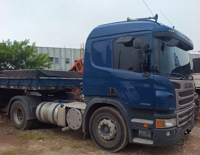 Scania P310 e Carreta grade baixa carga seca Noma 