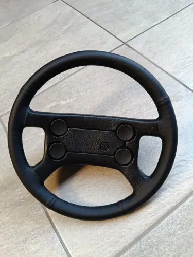 Volante 4 bolas original revestido tipo gol GTI.