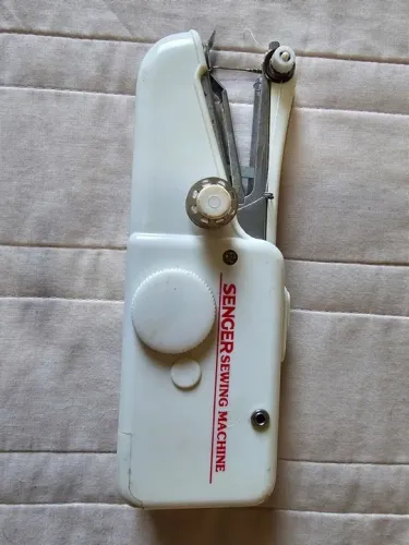 Máquina de costura à mão Senger - leia o anúncio