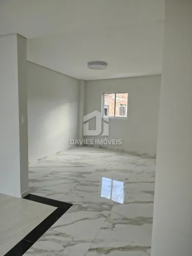 Apartamento no Centro / 65,85 M² / 2 Quartos sendo 1 suíte / Sacada com churrasqueiira a c