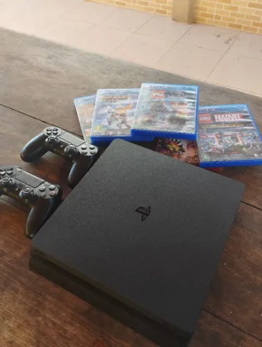 PlayStation PS4 slim 1T vendou ou troco por iPhone 14 ou superior ou Android top de linha 