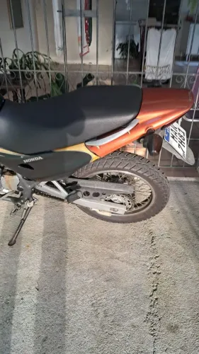 Vendo moto nx falcon 400 moto top td certo td em dia sem sinistro sem passagem por leilão