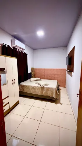 Espaço de lazer com área gourmet, piscina, quarto mobiliado 