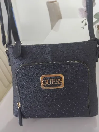 Bolsa guess original praticamente nova.