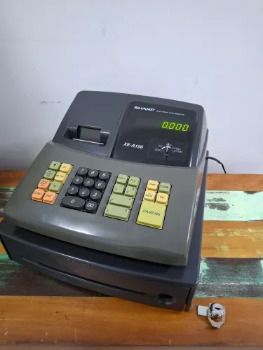Caixa registradora sharp xe-A106