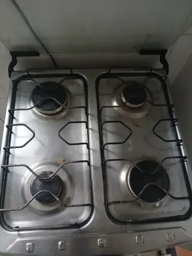 Fogão com marcas de uso