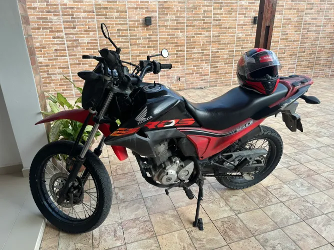 Moto impecável , muito boa , único dono