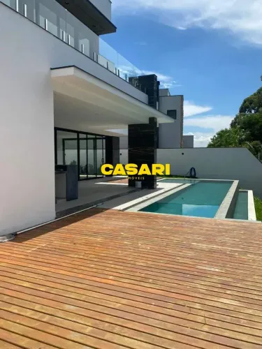 Casa com 3 dormitórios à venda, 406 m² por R$ 4.200.000,00 - Alphaville Nova Esplanada - V