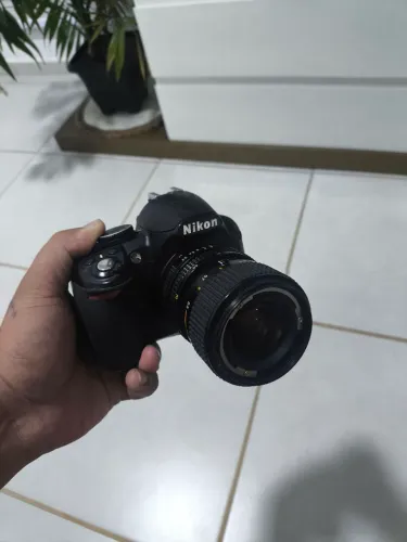 Camera nikon d3100 com  lente 35-70 manual 