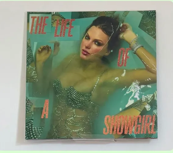 DISCO DE VINIL THE LIFE OF A SHOWGIRL TAYLOR SWIFT ORANGE GLITTER