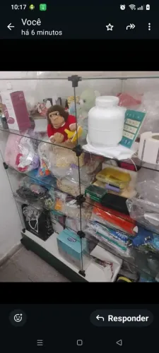 Prateleiras de vidros 1 com 12  partes ,1 com 8 , com base de ferro.1500,00 as 2.
