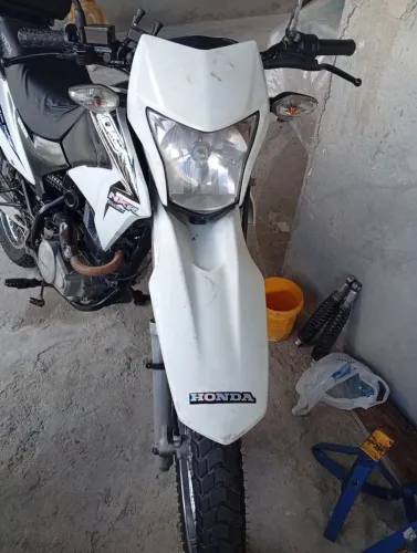Moto toda revisada pnus novos recibo em branco