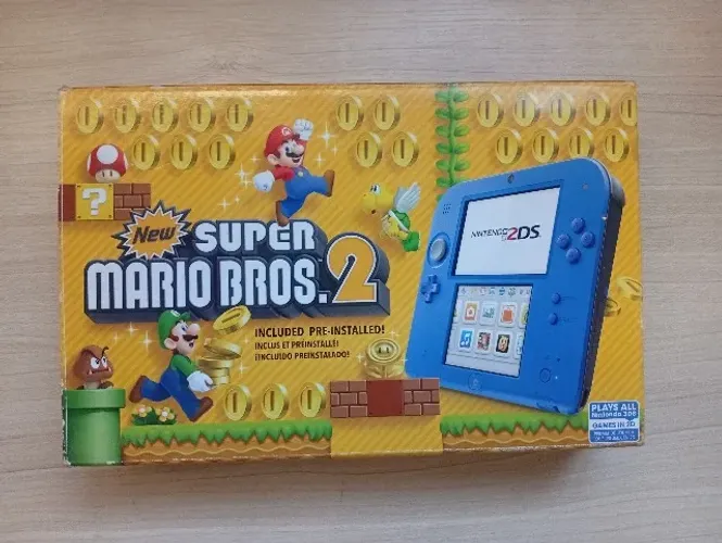 Nintendo 2DS na caixa com New Super Mario Bros 2