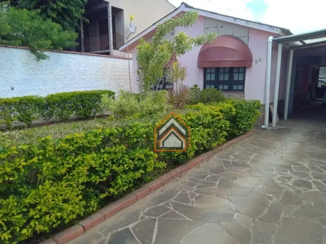 Casa com 3 dormitórios no bairro Americana , Alvorada/RS.