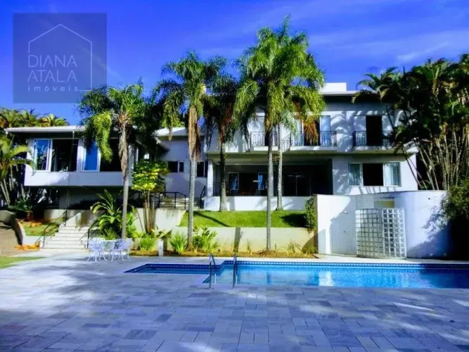 Casa com 4 suítes, 750 m² - venda por R$ 4.000.000 ou aluguel por R$ 22.170/mês - Condomín