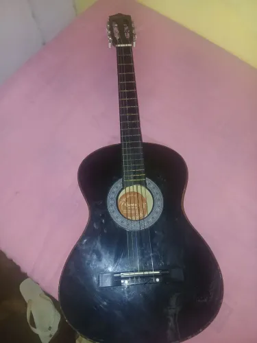 Violão novo, pouco tempo usado, tem conversa no valor