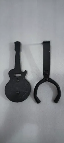 Suporte de parede para instrumentos de corda