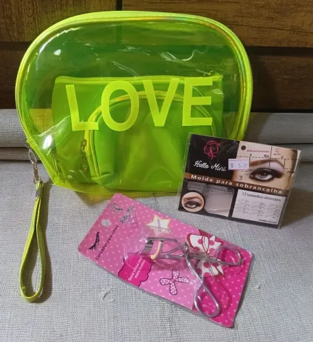 Kit necesser transparente e duas bolsas, curvador para cílios e Molde para Sobrancelhas.