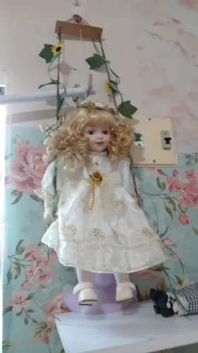 Boneca de porcelana anjo