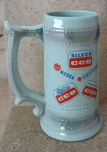 Antiga caneca de porcelana CCE - Kenwood - Mecca - Lions - Skol