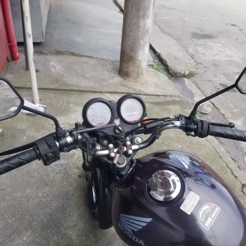 Vendo moto cg 125 2011 cor roxa valor 7.500 paralelo em até 12 vesez no cartão