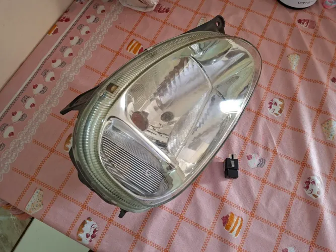 Farol Corsa Classic (lado direito) + botão farol milha
