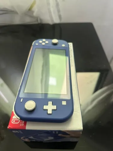 Nintendo Switch Lite Azul - Excelente Estado + Caixa e Carregador