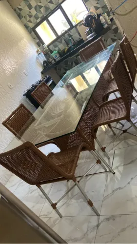 Vendo mesa 6 cadeiras tampo de vidro medindo 2.20x1.10