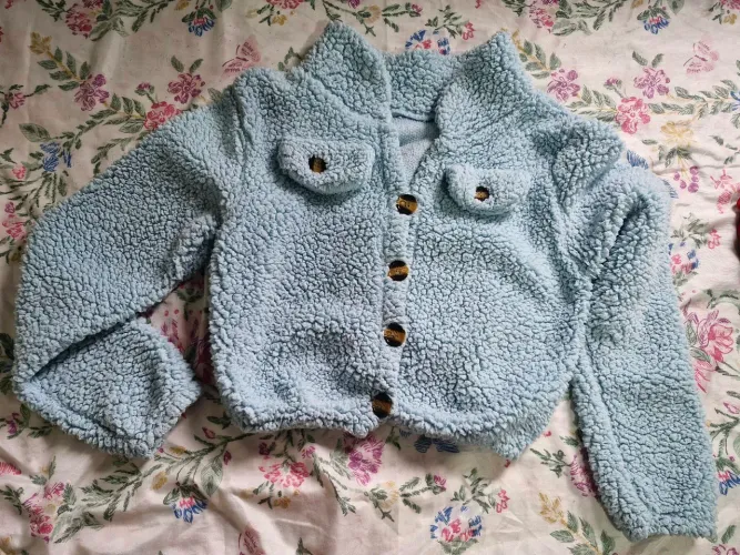 Blusa teddy