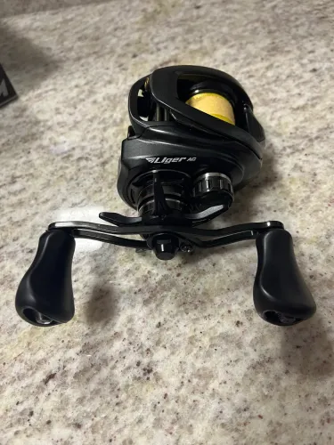 Carretilha Marine Liger AC + brinde