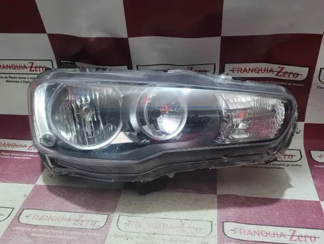 Farol lado direito lancer recuperado
