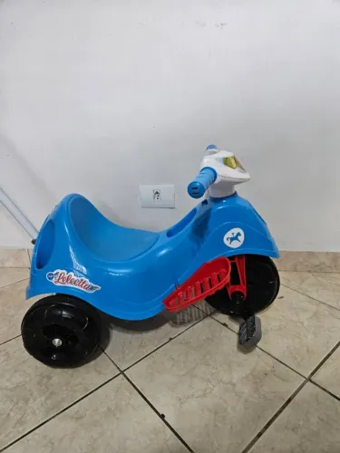 Motoca tico tico com barra de empurrar