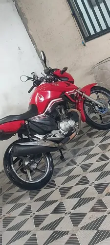Moto conservada, relação, pneu e óleo novo, só pegar e andar, aceito troca em mais nova