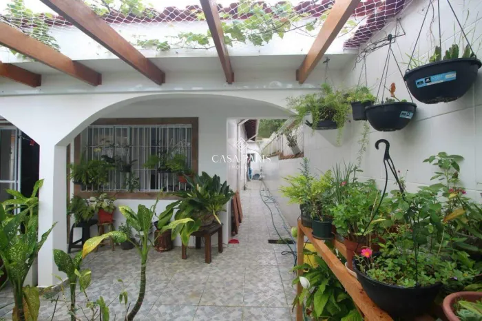 Casa à venda em Praia Grande (Mirim)  3 quartos, 4 vagas