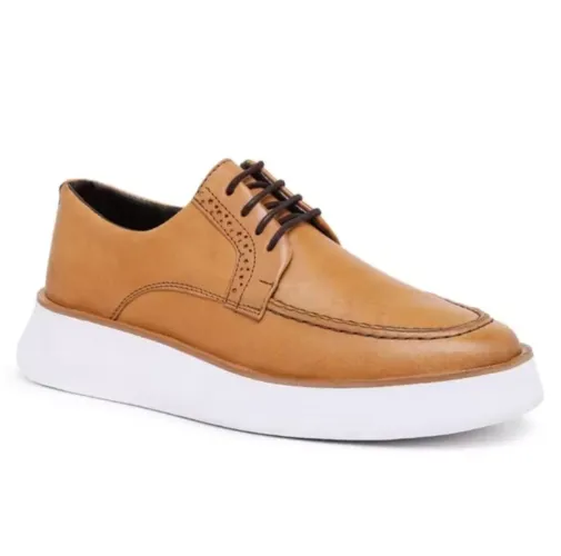 Sapato Oxford elegante em couro legítimo. 