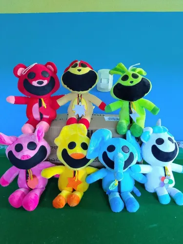 Pelúcia Smiling Critters
