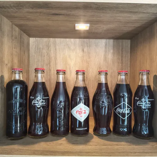 Coca cola garrafas colecionáveis retrô - 7 garrafas raras