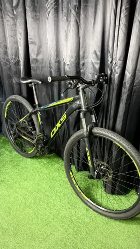 Bicicleta OXS Glide 100 Aro 29 Componentes Shimano Freio a Disco - Pronta para Uso