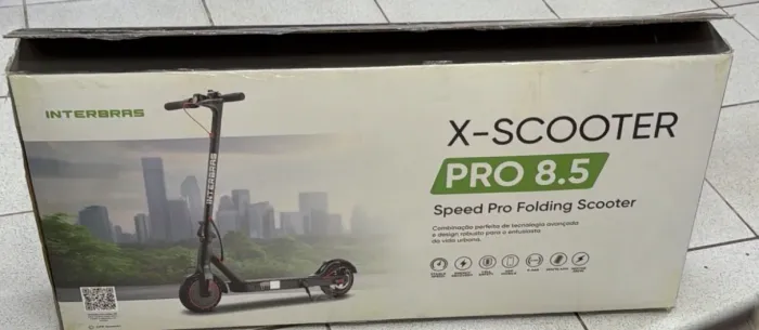 Patinete novo na caixa .