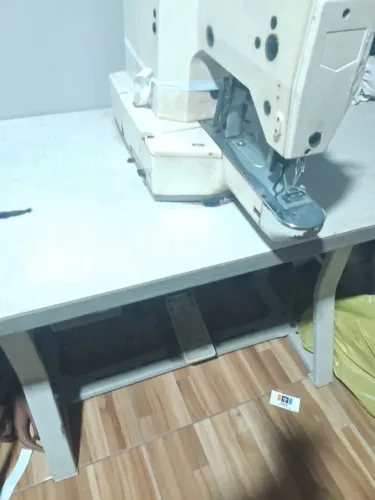 Máquina de costura travete