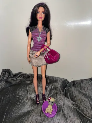 Boneca Barbie Raquelle bichinhos mattel articulada