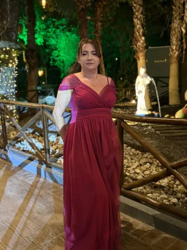 Vestido na cor fuscia semi novo