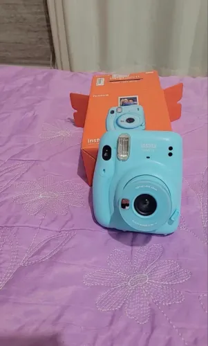 Vendo câmera polaroide nova