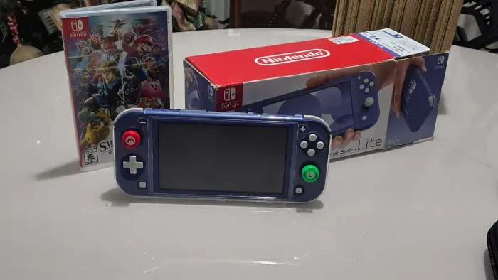 Nintendo swicht lite+cartão 64g+super smash.