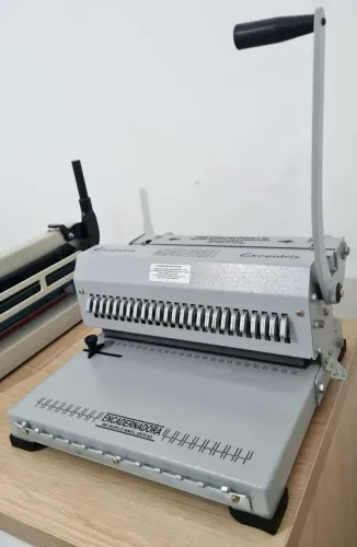 Encadernadora Excentrix 2x1 furo quadrado