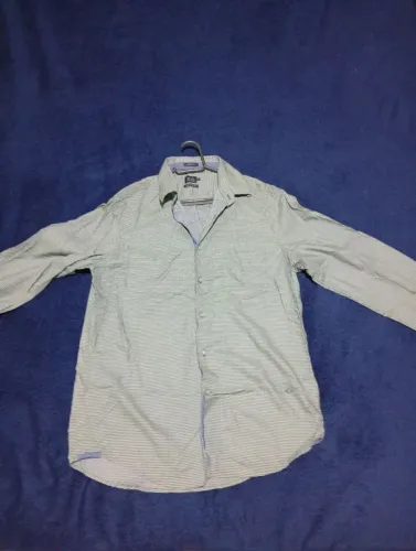Camisa Richards social